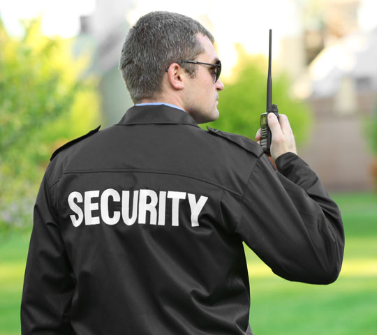 Security guard communicating on mobile device