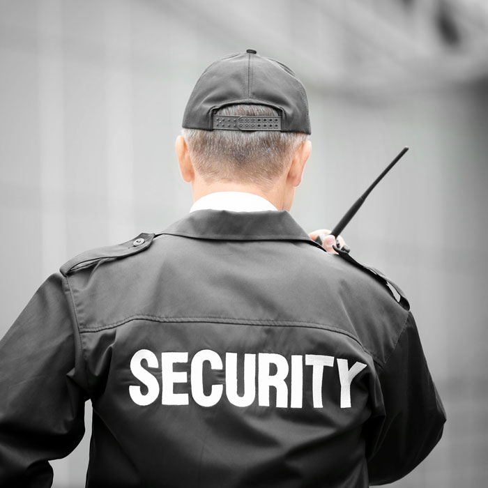 Security guard in black jacket